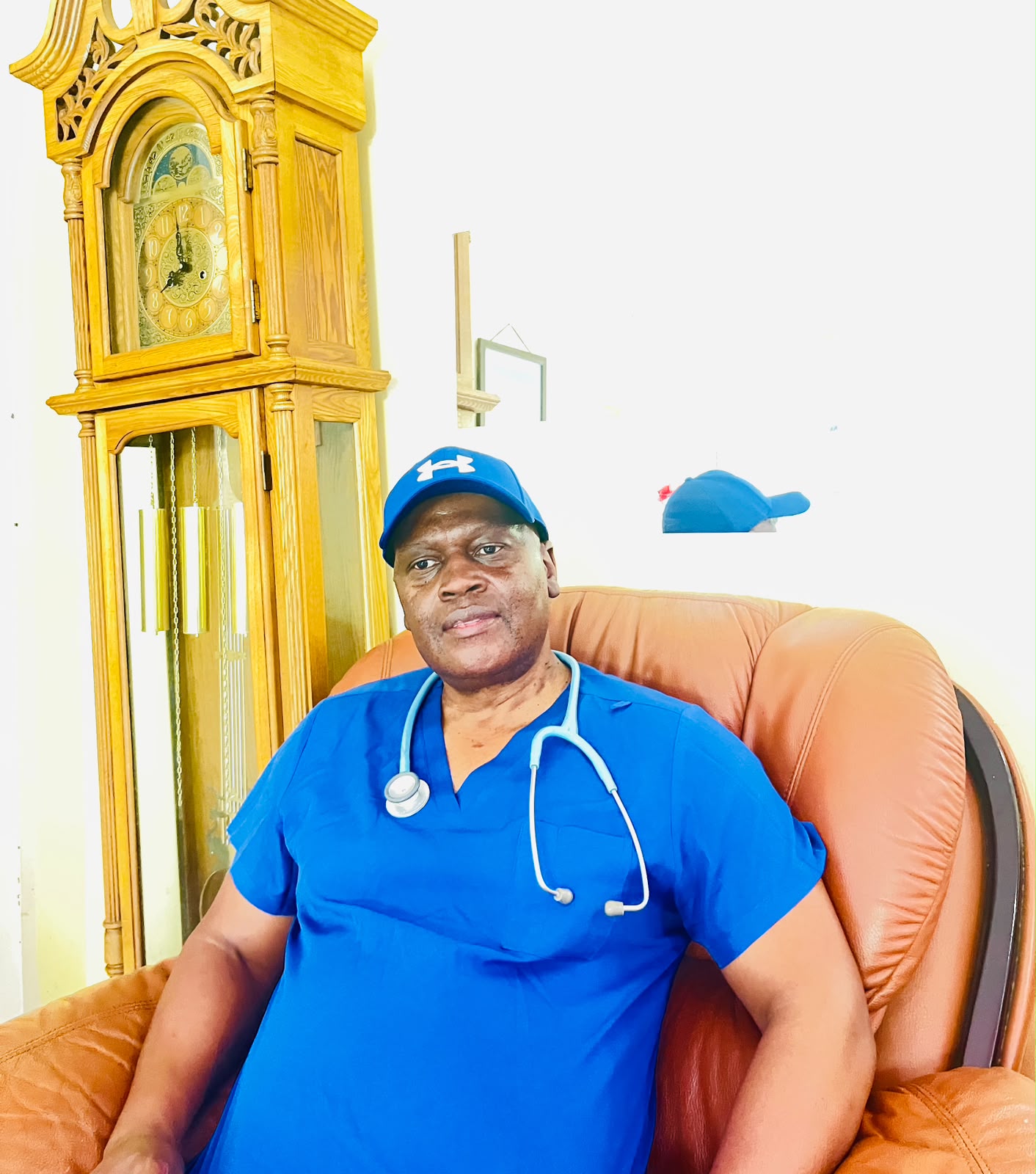 Mr Bhekisisa Arnold Dhladhla in blue practice scrubs